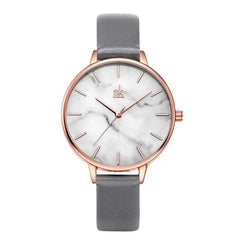 Shengke Fashion Watch for Women with rose gold case, marble dial, and grey leather strap