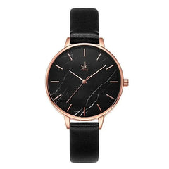 Shengke Fashion Watch for Women with black marble dial, rose gold case, and black leather strap, elegant minimalist design