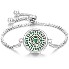 Stainless steel perfume bracelet with adjustable chain and green heart diffuser design
