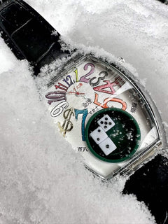 Miura Japanese Dice Vintage Watch with colorful numbers and dice design in snow close-up