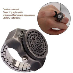 Vintage finger watch with flip-up cover, quartz movement, and stretchy alloy band.