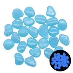Blue glow in the dark garden pebbles for outdoor and aquarium decoration