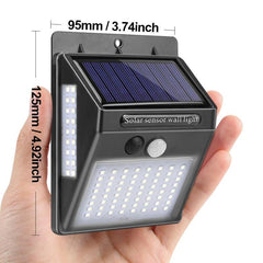 Compact Garden Solar Lamp with motion sensor, 100 LED lights, solar panel, waterproof design, handheld size for outdoor wall mounting