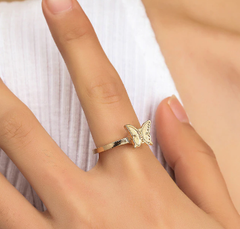 Fidget Spinner Rotatable Ring for women with butterfly design in gold-tone metal on finger