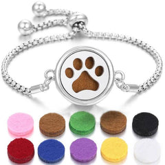 Stainless steel perfume bracelet with paw print charm and colorful interchangeable scent pads