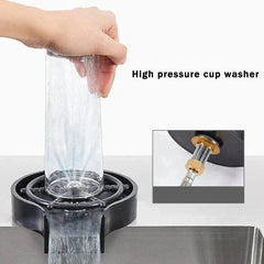 High Pressure Cup Washer in black ABS plastic rinsing a glass with water for kitchen or coffee bar use.