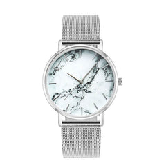 Minimalist marble face watch with silver mesh band and slim profile