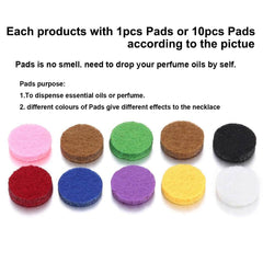 Stainless steel perfume bracelet with colorful replaceable scent pads for essential oils or perfume.