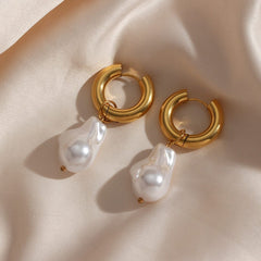 Gold chunky hoop Water Drop Earrings with removable baroque-style pearl charms on silk background