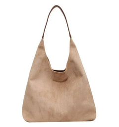 Large beige one-shoulder underarm suede bag with simple casual design and spacious capacity
