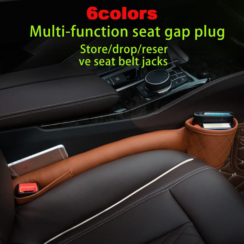 Leather Car Seat Gap Filler organizer in brown PU leather inserted between car seat and center console with storage pockets for phone and keys