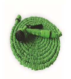 Expandable green flexible garden hose with adjustable spray nozzle and ergonomic handle