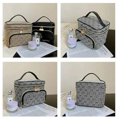 Hello Kitty makeup bag in multiple colors with handle, zippered compartments, and compact design for storing cosmetics.