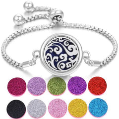 Stainless steel perfume bracelet with adjustable chain and ornate black and silver diffuser, includes colorful scent pads for personalized fragrance.