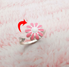 Fidget Spinner Rotatable Ring for women featuring a pink flower design on a metal band with a smooth spinning center.