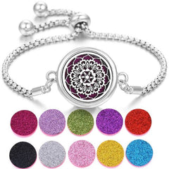 Stainless Steel Perfume Bracelet with adjustable chain and colorful scent pads, elegant floral design on diffuser.