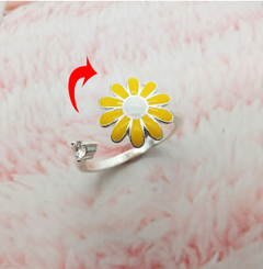 Fidget spinner rotatable ring for women with yellow flower design and smooth spinning centerpiece, made of premium metal.